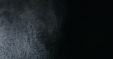Water spray, microbes in air simulation, on black background Stock Footage 137925307