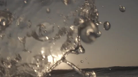 Water spray in super slow motion (sunset) Stock Footage 43060451