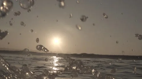 Water spray in super slow motion (sunset) Stock Footage 43060463