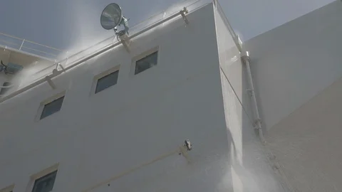 Water spray system test on superstructure of ship Stock Footage 115125064