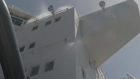 Water spray system test on superstructure of ship Stock Footage 115125427
