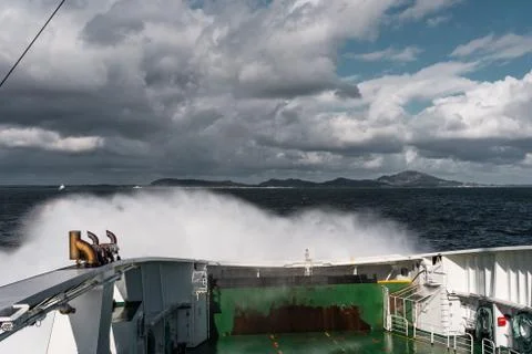 Water spraying on the car deck when the waves hits the ferry, Mortavika - Ars Stock Photos