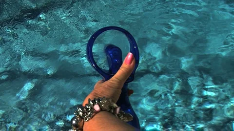 Water spraying fan, by a Pool Stock Footage 930242