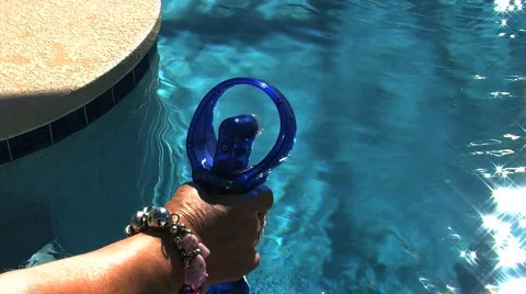Water spraying fan, by a Pool Stock Footage 930590