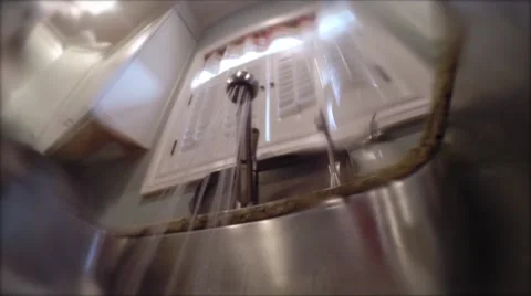 Water spraying in sink Stock Footage 43308491