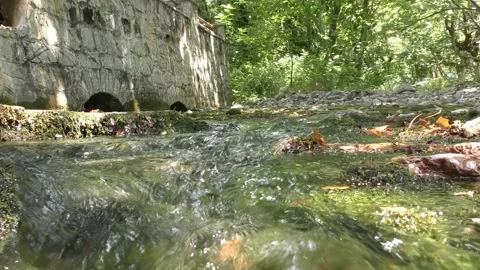 Water Spring Flowing by Stone Wall Agia Theodora Vasta Vídeo Stock 344400454