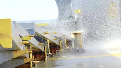 Water sprtayed on deck of the ship slow Stock Footage 328599619