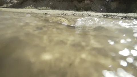 Water stream close up in slow motion Video stock 79736772