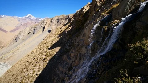 Water stream creating waterfalls at Andes Mountains rugged landscape Stock-Footage 106907290