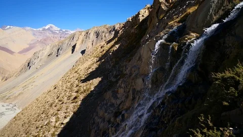 Water stream creating waterfalls at Andes Mountains rugged landscape Stock-Footage 106907795