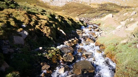 Water stream creating waterfalls at Andes Mountains rugged landscape Stock-Footage 106910161