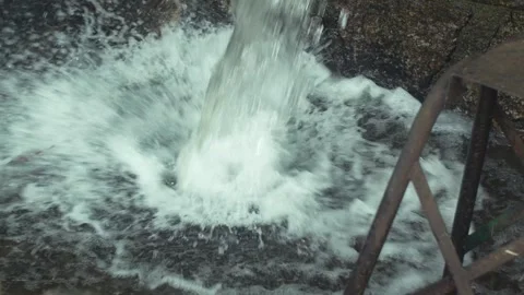 Water Stream Falling Down From a Pipe in a Public Park Stock Footage 263965862