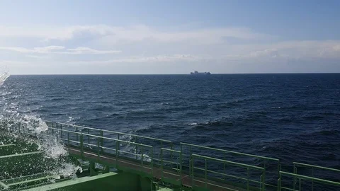 Water stream falls down into oil tanker deck reservoir Stock Footage 115695215