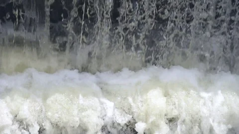 Water from a stream falls from a height close up Stock Footage 109591842