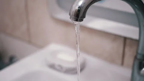 Water Stream from Faucet Close up Stock Footage 312011208