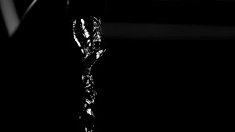Water stream flows in black and white artistic Stock Footage 326756207