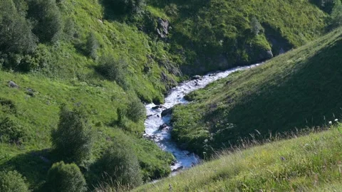 Water stream or river down the canyon Stock Footage 248380641