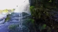 Water stream pounding against rocks, waterfall, slow motion HD Footage