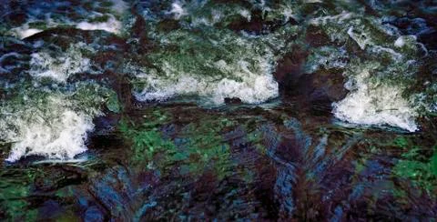 Water stream in a river Stock Photos