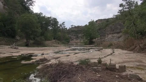 Water stream river stone brook creek ravine nature mountain valley afternoon Stock Footage 330471470