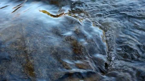 A water stream on the rock Stock Footage 22155235