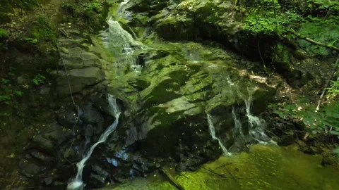 Water stream on rocks Stock Footage 240784139