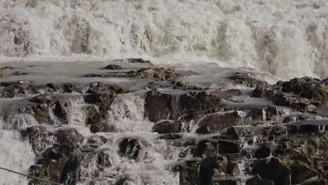 Water stream running over basalt rocks Stock Footage 319273400
