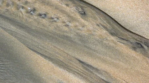 Water Stream in Sand Bed Stockbeeldmateriaal 53209891