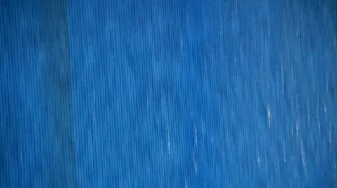 Water stream slides from blue ceramic surface Stock-Footage 10751111