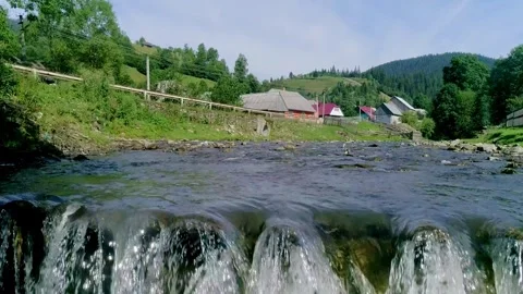 Water stream small river close up and slow motion Stock Footage 322061742