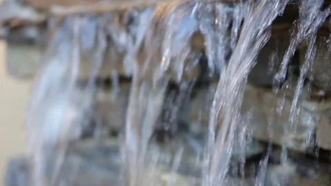 Water stream splashing on ground Stock Footage 72076286