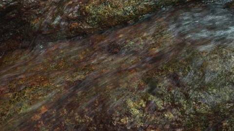 Water stream texture over rock bed Stock Footage 332099835
