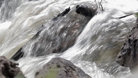 Water stream through obstacles Stock Footage 202069288