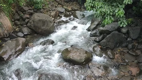 Water stream through rocks Stock Footage 134787190