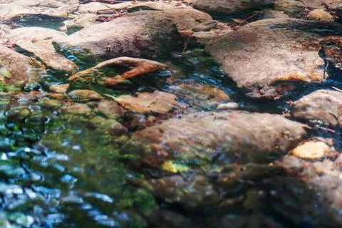 Water stream with transparent texture Stock Photos