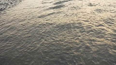 Water stream from waves coming back to the sea Stock Footage 93629632