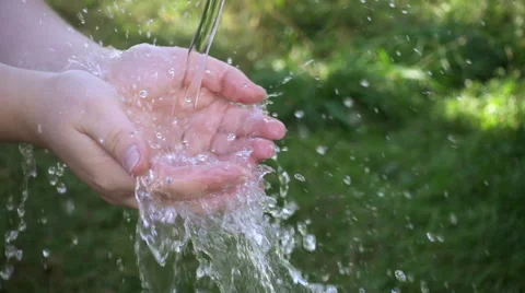 Water stream into woman’s hands Stock Footage 67629850