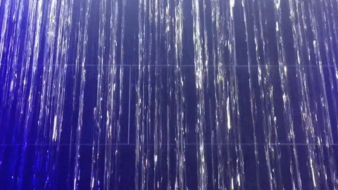 Water streaming down Blue Bricks like Rain Stock Footage 128841075