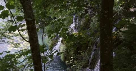 Water streaming down a waterfall at the Plitvice lakes, Croatia Stock Footage 79577831