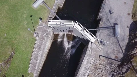 Water streaming through closed block at canal in Finland. Stock Footage 152948122