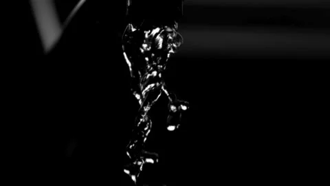 Water streams collide and splash on black. Stock Footage 326629762