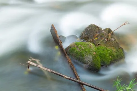 Water in streams Stock Photos