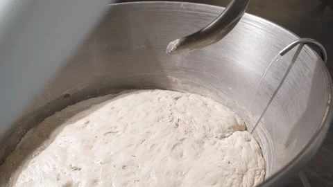 Water supply to the dough starter container in the dough mixer in the bakery. An Video stock 295875227