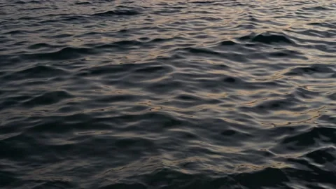Water surface after sunset with calm little waves Stock Footage 175135190