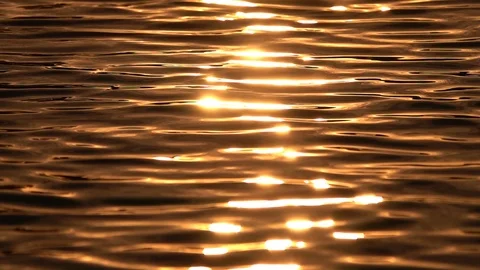 Water Surface and Sunset Reflections 240fps Slow Motion x8 Loop 02 Stock Footage 121598352