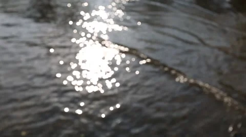 Water surface with bokeh of sun Stock Footage 48788132
