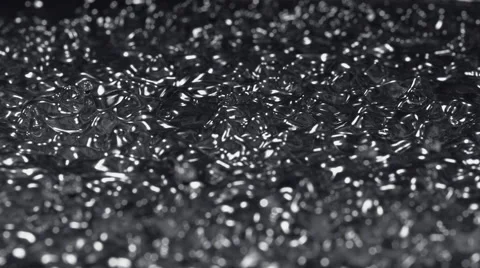 Water surface bouncing and making splash. Slow Motion. Stock Footage 55538635