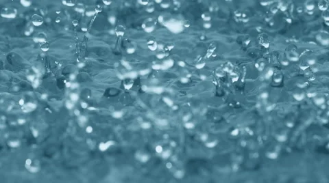 Water surface bouncing and making splash. Slow Motion. Stock Footage 55538673