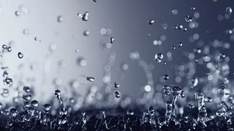 Water surface bouncing and making splashes. Slow Motion. Stock Footage 65371999