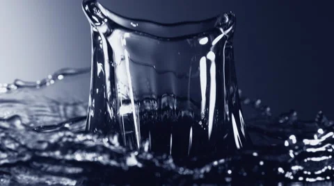 Water surface bouncing and making splashes. Slow Motion. Stock Footage 67423125